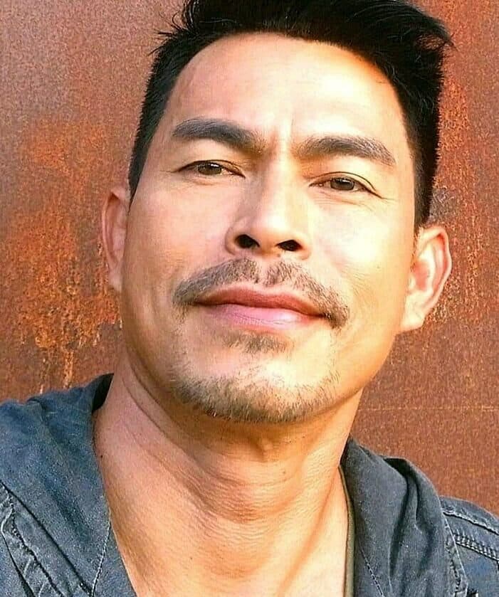 หนุ่ม จรัญ งามดี